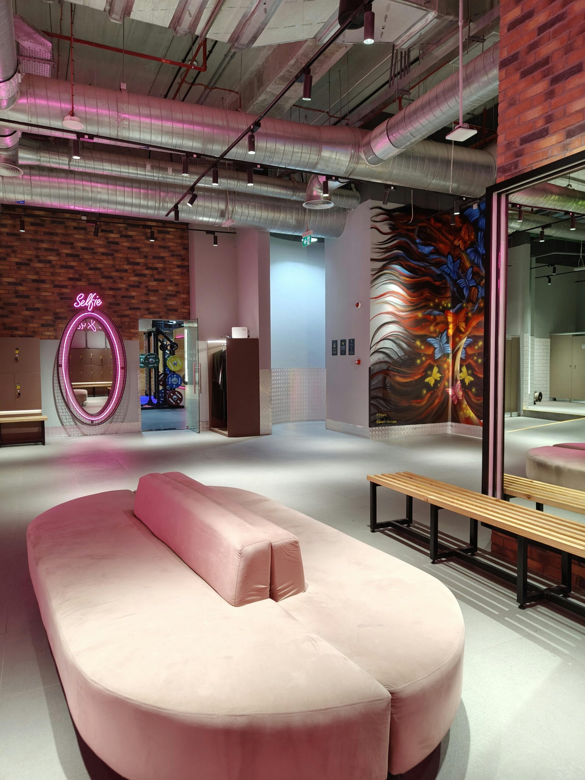 Chic urban space with modern design features and vibrant graffiti wall.